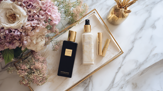 Lumiskin Cosmetics luxury hair oils and treatments on marble tray with flowers